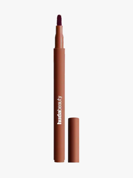 Huda Lip Contour Lip Stain in branded component on a light gray background