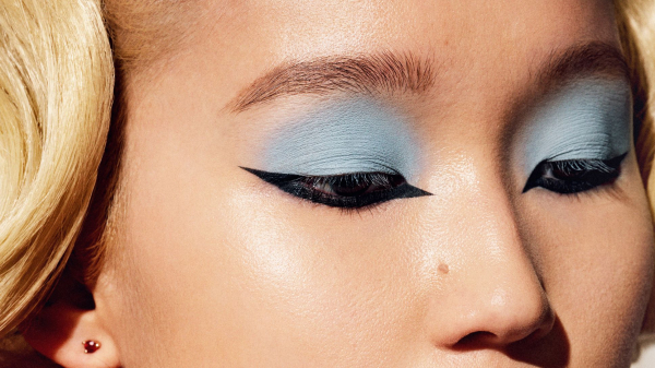 Woman with blue eyeshadow modeling